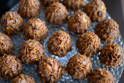 A set of energy ball snacks laid out on a tray. 